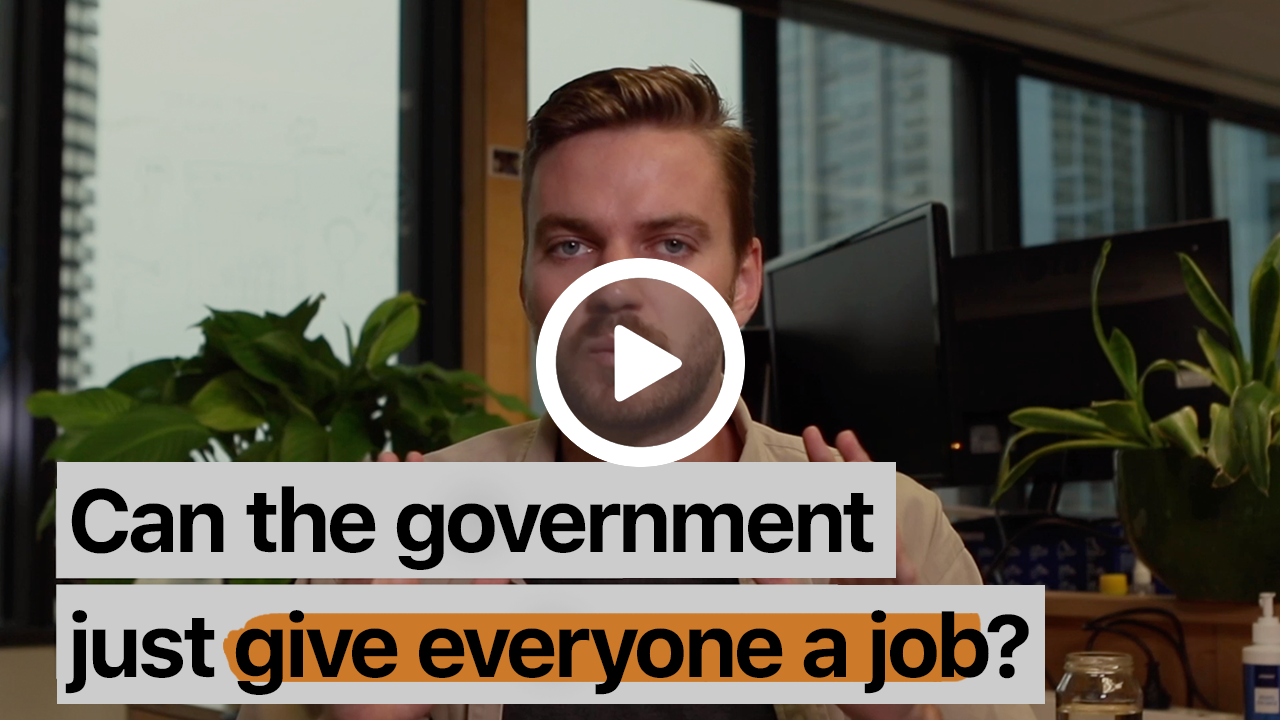 A still frame of a video with a play button on it. The video has a title that reads "can the government just give everyone a job?" It is superimposed over the face of a slim, masc, bearded presenter.