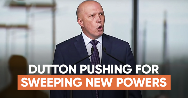 Minister Dutton talking in front of Parliament House