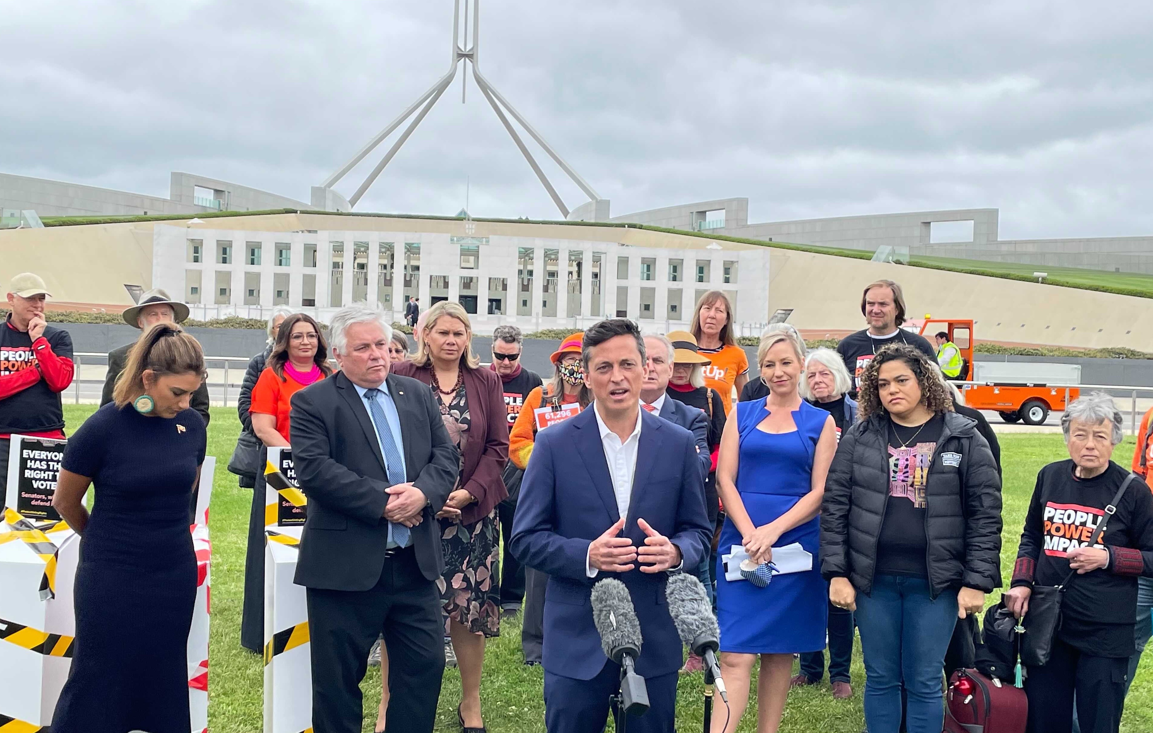 Image of Senators with GetUp staff and members outside of Parliament House.